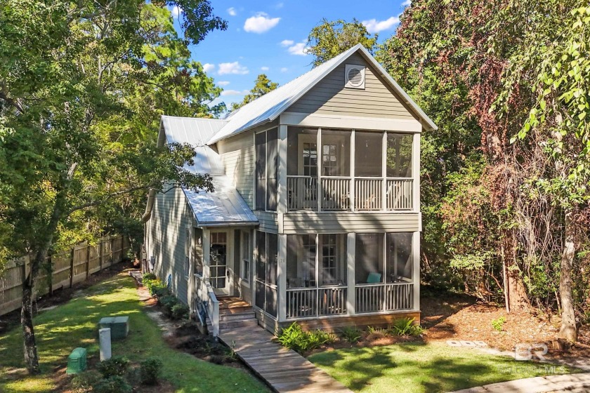 Tucked away in the charming Fish Camp community, this 3-bedroom - Beach Home for sale in Orange Beach, Alabama on Beachhouse.com