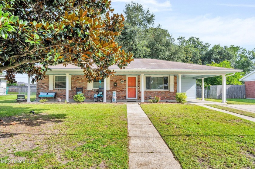 Just a short stroll to the beach, this charming home offers the - Beach Home for sale in Gulfport, Mississippi on Beachhouse.com