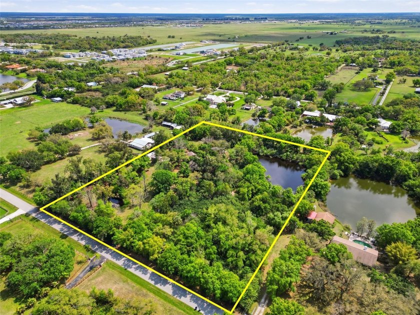 Tucked away off Clark Road in Sarasota, this extraordinary - Beach Acreage for sale in Sarasota, Florida on Beachhouse.com