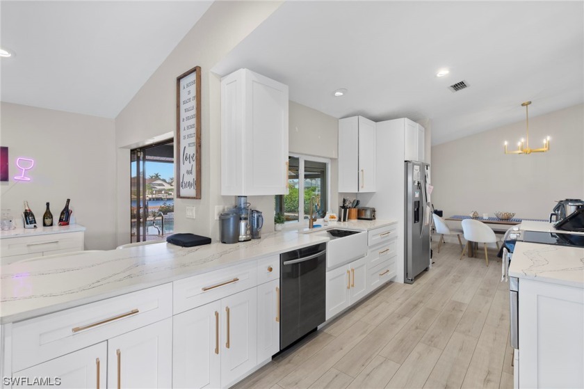 Discover this beautifully renovated home in one of the most - Beach Home for sale in Cape Coral, Florida on Beachhouse.com