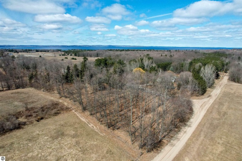 Escape to the picturesque beauty of Traverse City, MI with this - Beach Acreage for sale in Traverse City, Michigan on Beachhouse.com