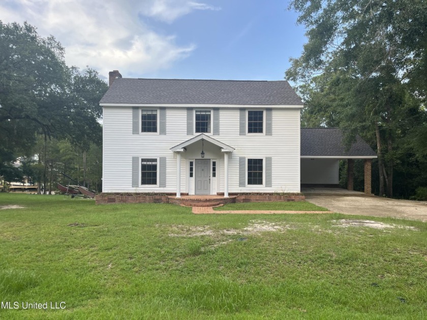 Beautiful two-story house located on the bayou.   New HVAC Unit - Beach Home for sale in Gautier, Mississippi on Beachhouse.com