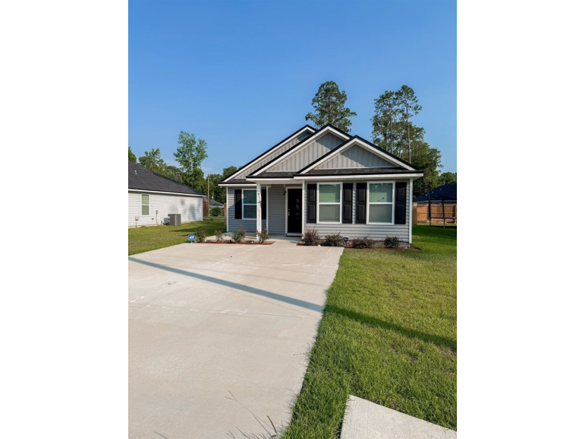 The beach is calling... Don't miss out on this beautiful fully - Beach Home for sale in Crawfordville, Florida on Beachhouse.com