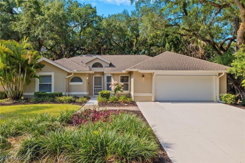 Nestled under sprawling oak trees, native palms and dense - Beach Home for sale in Estero, Florida on Beachhouse.com