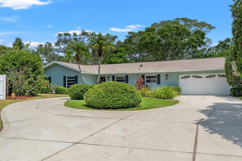 Welcome to 1240 Harbor Lake Drive -- an exceptional 3-bedroom - Beach Home for sale in Largo, Florida on Beachhouse.com