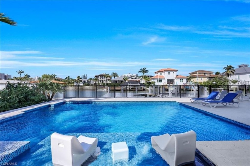 Experience the ultimate in this modern, coastal and contemporary - Beach Home for sale in Naples, Florida on Beachhouse.com