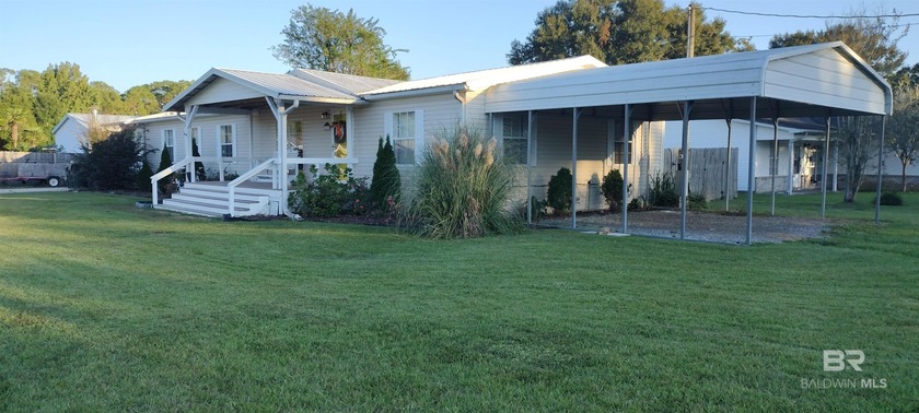 This is a large 3 bedroom, 2 bath doublewide mobile home in a - Beach Home for sale in Lillian, Alabama on Beachhouse.com