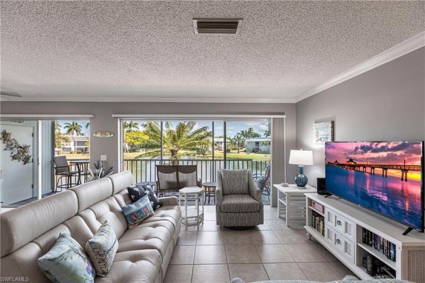 Experience the ultimate vacation lifestyle in this charming and - Beach Home for sale in Fort Myers, Florida on Beachhouse.com