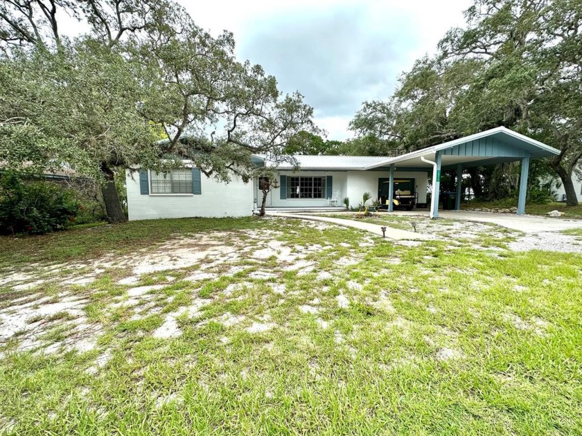 Take a look at this large three-bedroom, two-bath water front - Beach Home for sale in Cedar Key, Florida on Beachhouse.com