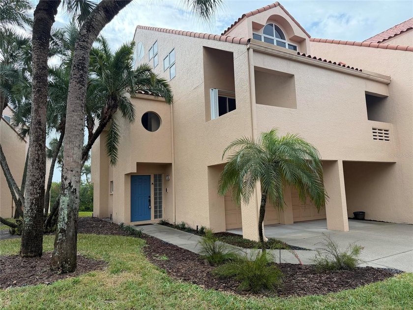Located in the calm, serene, private gated-community of Royal - Beach Townhome/Townhouse for sale in St. Petersburg, Florida on Beachhouse.com