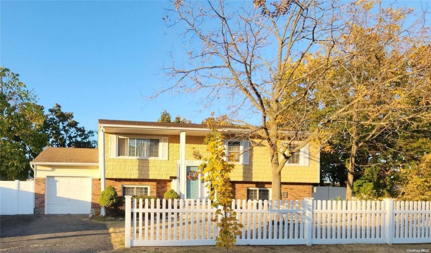 Sunny & Bright- Open Concept Layout- Wide line Hi-Ranch Style - Beach Home for sale in West Islip, New York on Beachhouse.com