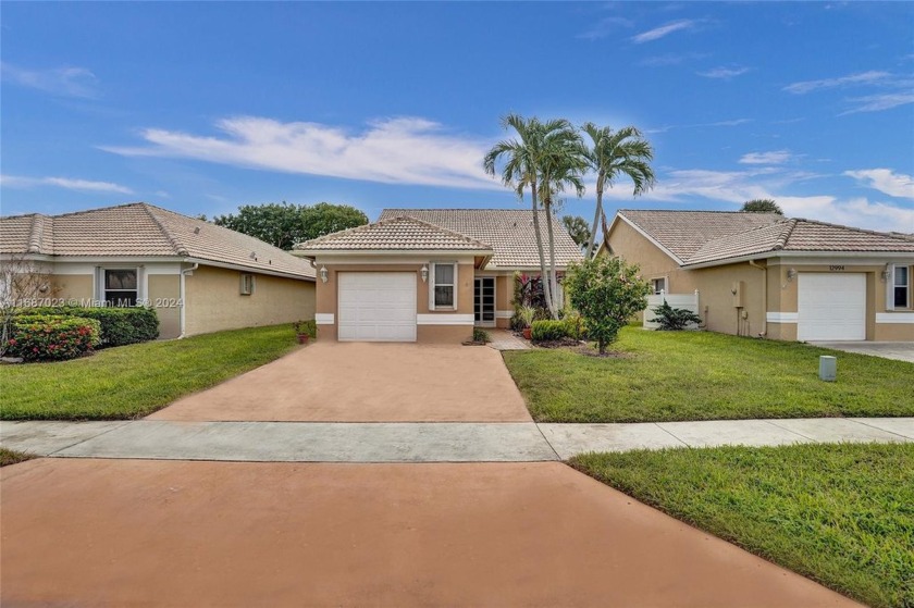 Welcome to this bright, beautifully maintained home in an active - Beach Home for sale in Boynton Beach, Florida on Beachhouse.com