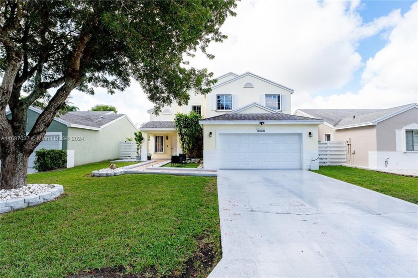 This two-story home with playground and basketball court right - Beach Home for sale in Miami, Florida on Beachhouse.com