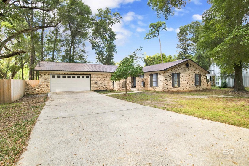 Welcome to this beautifully renovated 4-bedroom, 3-bathroom home - Beach Home for sale in Gulf Shores, Alabama on Beachhouse.com