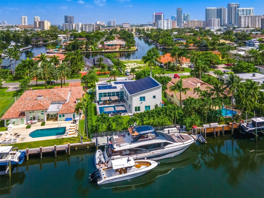 Stunning *turn-key* contemporary waterfront estate in the gated - Beach Home for sale in Hallandale  Beach, Florida on Beachhouse.com