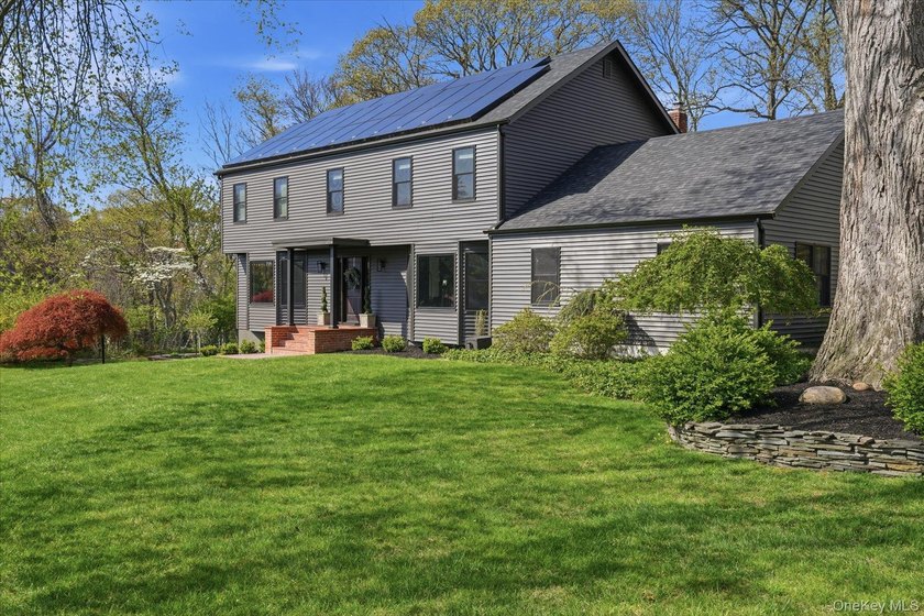 Located on a quiet cul-de-sac north of North Country Road in a - Beach Home for sale in Miller Place, New York on Beachhouse.com