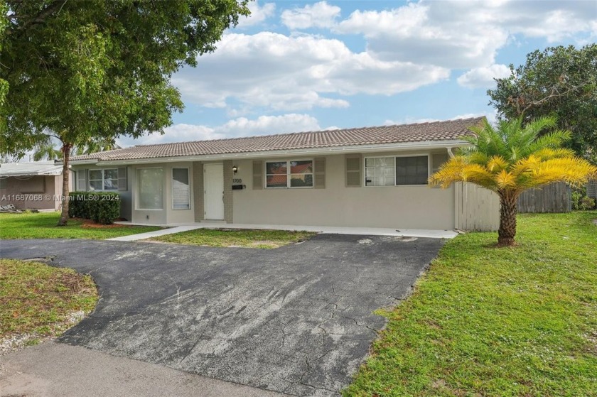 Experience waterfront living in this beautifully updated - Beach Home for sale in Pompano Beach, Florida on Beachhouse.com