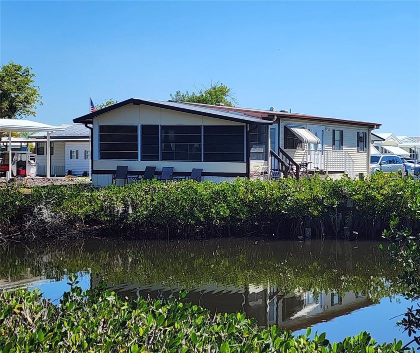 ENJOY THE WATER VIEW FROM THIS TWO BEDROOM 1 1/2 BATH MOBILE - Beach Home for sale in Bradenton, Florida on Beachhouse.com