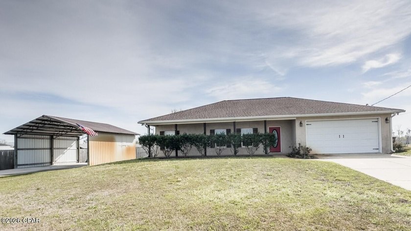 This charming home has all the extras with covered front and - Beach Home for sale in Panama City, Florida on Beachhouse.com