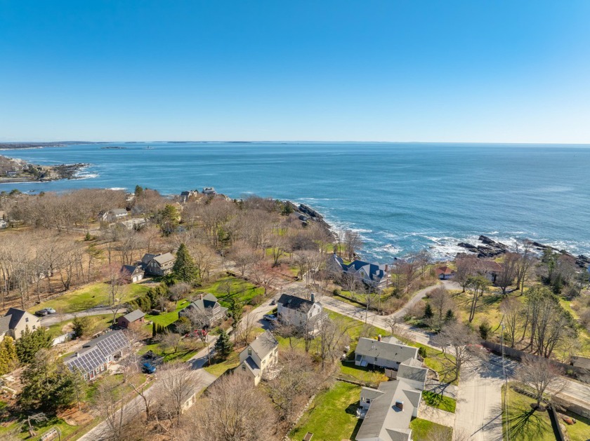 As you wind down beautiful Shore Road and come to the iconic - Beach Home for sale in Cape Elizabeth, Maine on Beachhouse.com