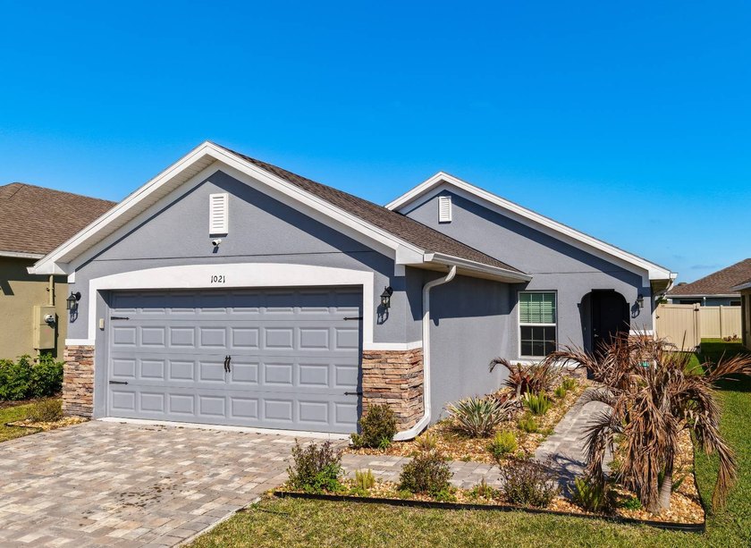 A nearly new home awaits you in the sought-after Gardens at - Beach Home for sale in Palm Bay, Florida on Beachhouse.com