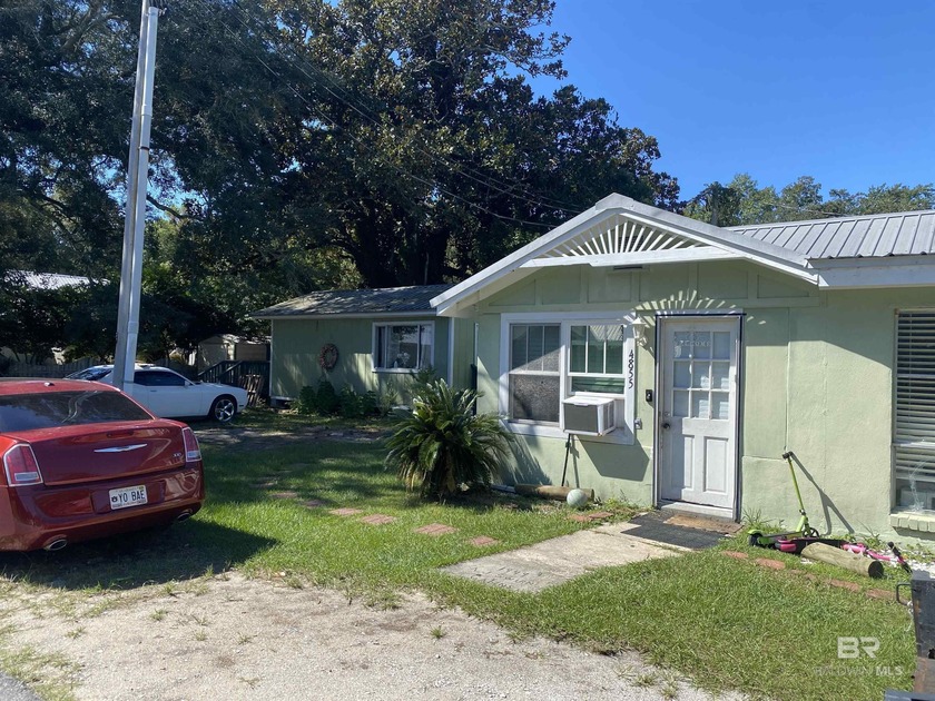 Cute cottage in Orange Beach with Deeded Back Bay Beach and Pier - Beach Home for sale in Orange Beach, Alabama on Beachhouse.com