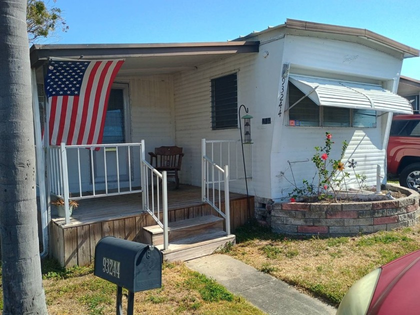 HIGH AND DRY,  SOLID, SPACIOUS HOME WITH A FRONT PORCH GRASSY - Beach Home for sale in Pinellas Park, Florida on Beachhouse.com