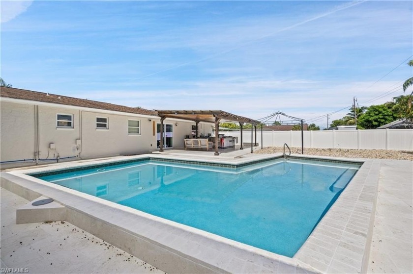 Step into your dream home with this beautifully remodeled pool - Beach Home for sale in Fort Myers, Florida on Beachhouse.com