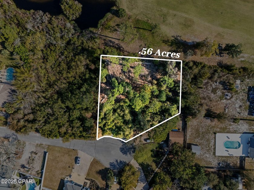 This oversized approximately 0.56-acre homesite on Diana Court - Beach Lot for sale in Panama City Beach, Florida on Beachhouse.com