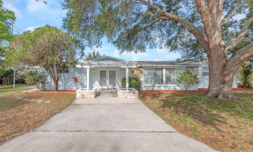 Welcome to this beautifully renovated 3-bedroom, 2-bathroom home - Beach Home for sale in St. Petersburg, Florida on Beachhouse.com
