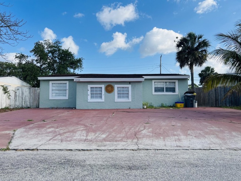 This charming 3-bedroom, 1-bathroom home is located at 4219 N - Beach Home for sale in West Palm Beach, Florida on Beachhouse.com