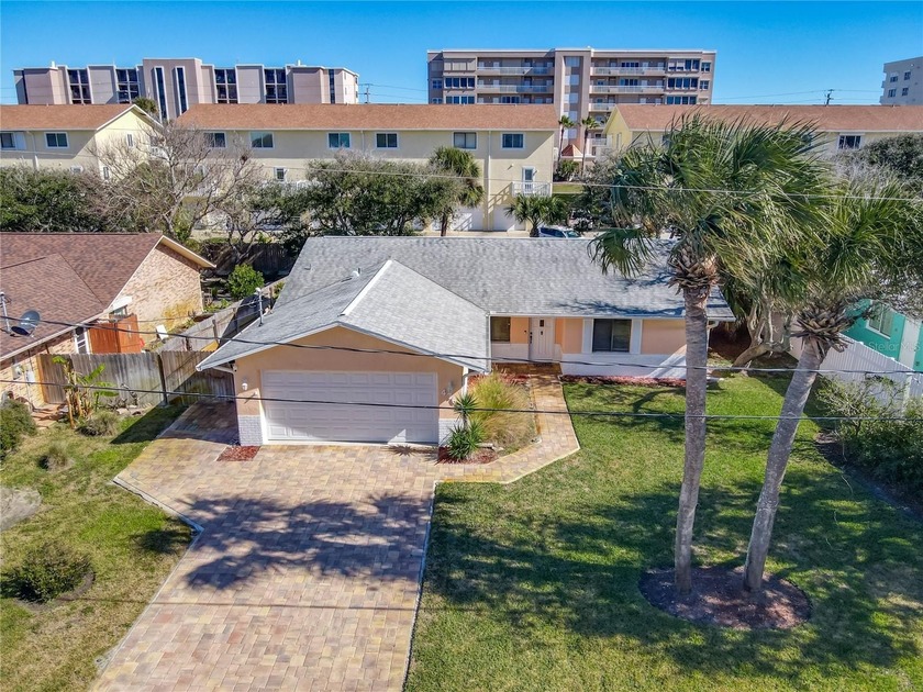 Discover this beautifully updated ranch-style home, where - Beach Home for sale in Ponce Inlet, Florida on Beachhouse.com