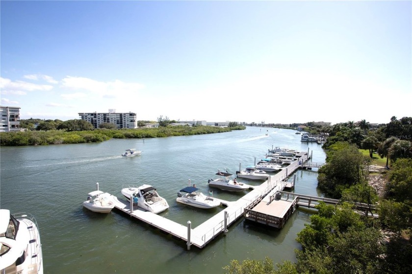 Take advantage of this fully furnished turnkey waterfront unit - Beach Home for sale in Indian Rocks Beach, Florida on Beachhouse.com