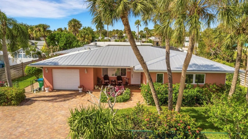 Discover the Ultimate Coastal Living Experience with this Cozy 3 - Beach Home for sale in Holmes Beach, Florida on Beachhouse.com