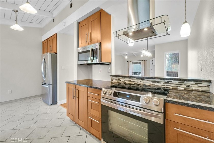 Located in the highly sought-after MacArthur Village, this - Beach Condo for sale in Santa Ana, California on Beachhouse.com