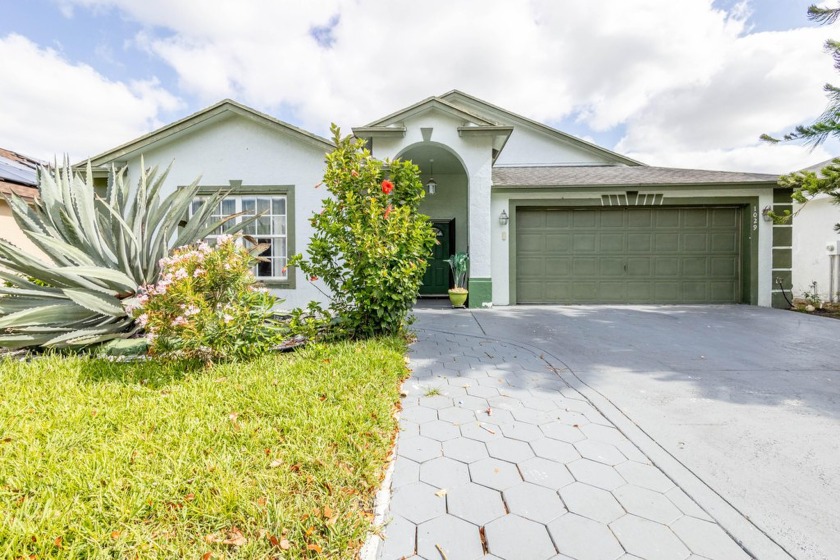 Get ready to call this beautiful single family 3 bedroom 2 bath - Beach Home for sale in Greenacres, Florida on Beachhouse.com