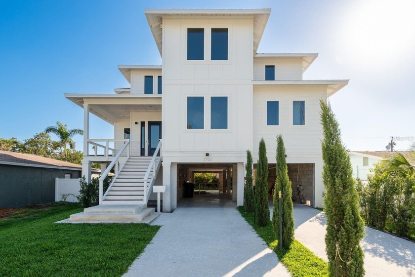 Step into an extraordinary expression of architectural elegance - Beach Home for sale in St. Petersburg, Florida on Beachhouse.com