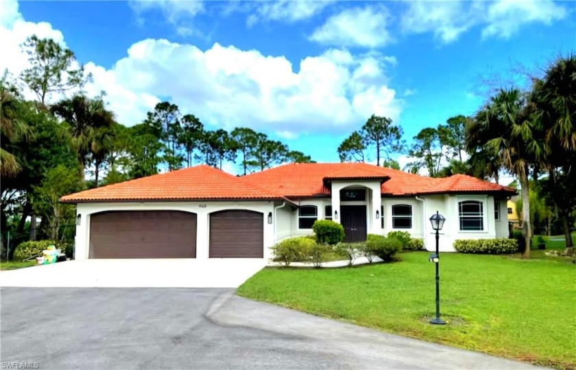 2.8 acres fully landscaped. Meticulously upgraded home and pool - Beach Home for sale in Naples, Florida on Beachhouse.com