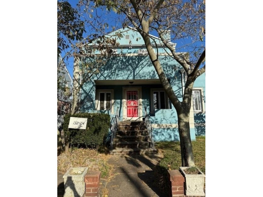 This expansive corner property is designated as a two-family - Beach Home for sale in Rockaway Park, New York on Beachhouse.com