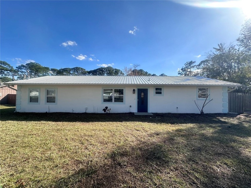 Set on approximately 2.5 acres in Edgewater, this - Beach Home for sale in Edgewater, Florida on Beachhouse.com