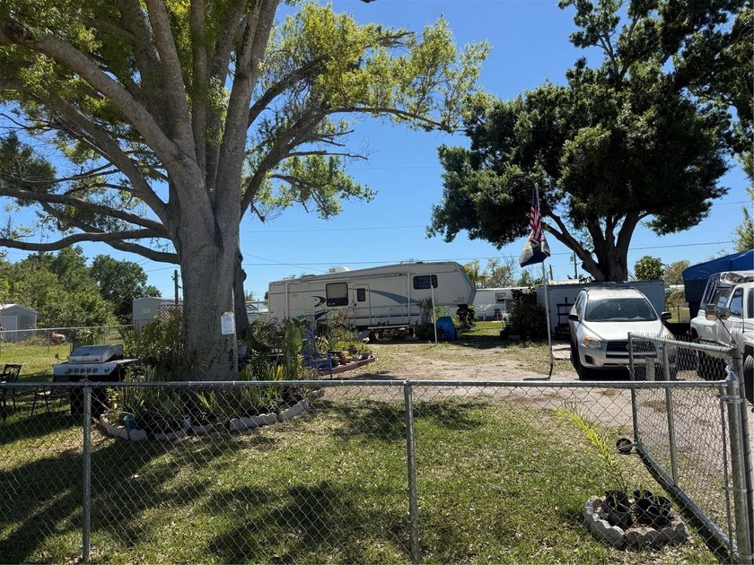 BRAND NEW FENCE!!! Zoned MHC for mobile home conventional. This - Beach Lot for sale in Port Charlotte, Florida on Beachhouse.com