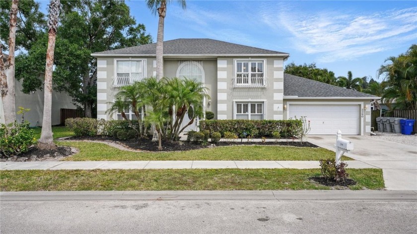Tucked inside the gated community of Compass Pointe, this - Beach Home for sale in Vero Beach, Florida on Beachhouse.com