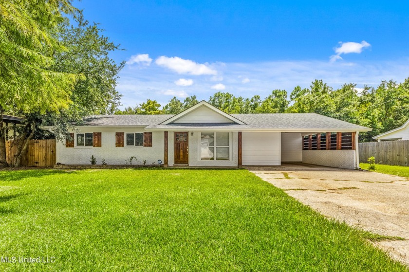 This stunning residence boasts an open floor plan, ideal for - Beach Home for sale in Bay Saint Louis, Mississippi on Beachhouse.com