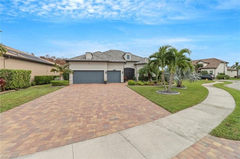 Situated on a picturesque oversized homesite, this sought-after - Beach Home for sale in Estero, Florida on Beachhouse.com