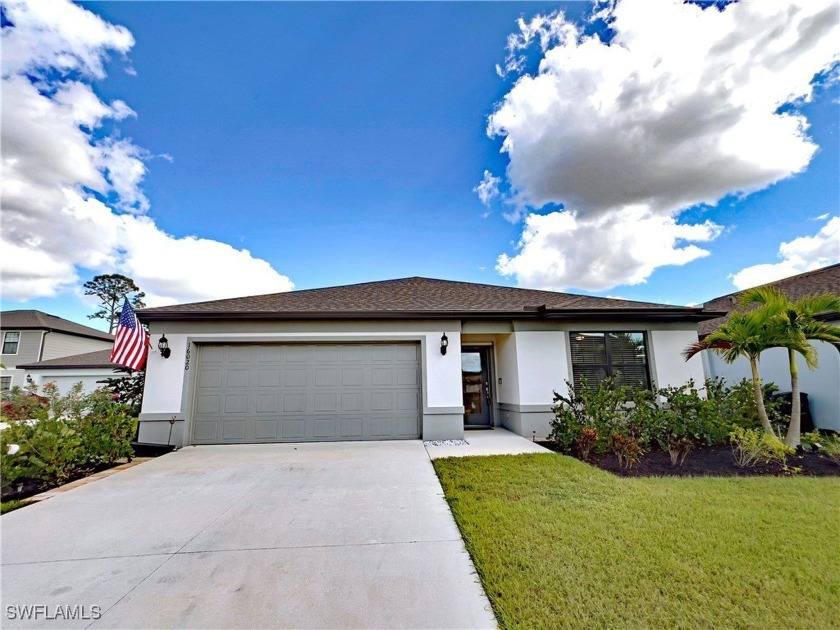 This move-in ready four-bedroom, two-bath pool home reflects the - Beach Home for sale in North Fort Myers, Florida on Beachhouse.com