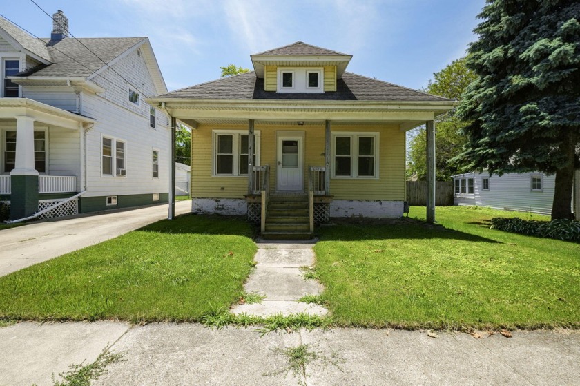 Nestled in Mt. Pleasant, this charming bungalow offers wood - Beach Home for sale in Mount Pleasant, Wisconsin on Beachhouse.com