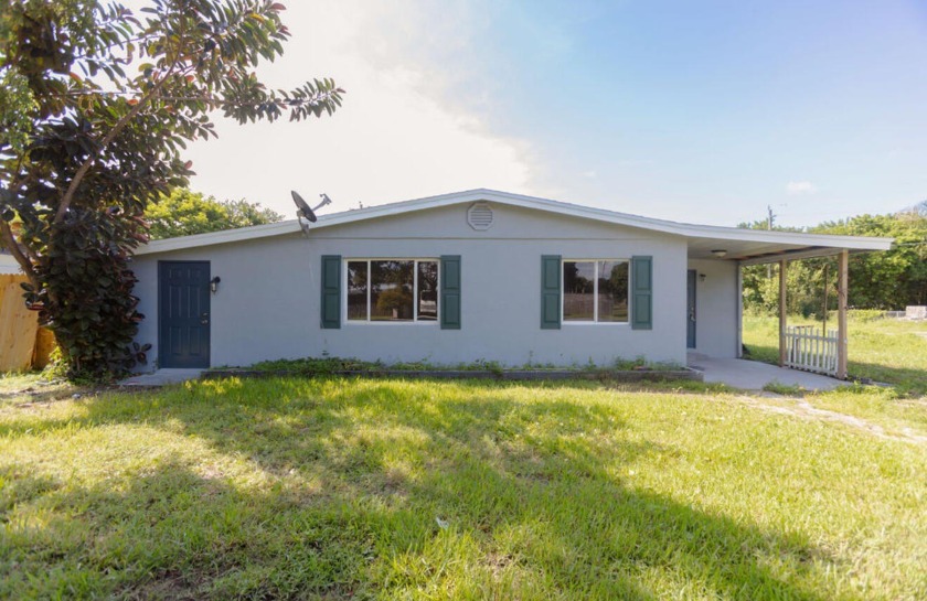 This charming renovated home combines classic character with - Beach Home for sale in Fort Pierce, Florida on Beachhouse.com