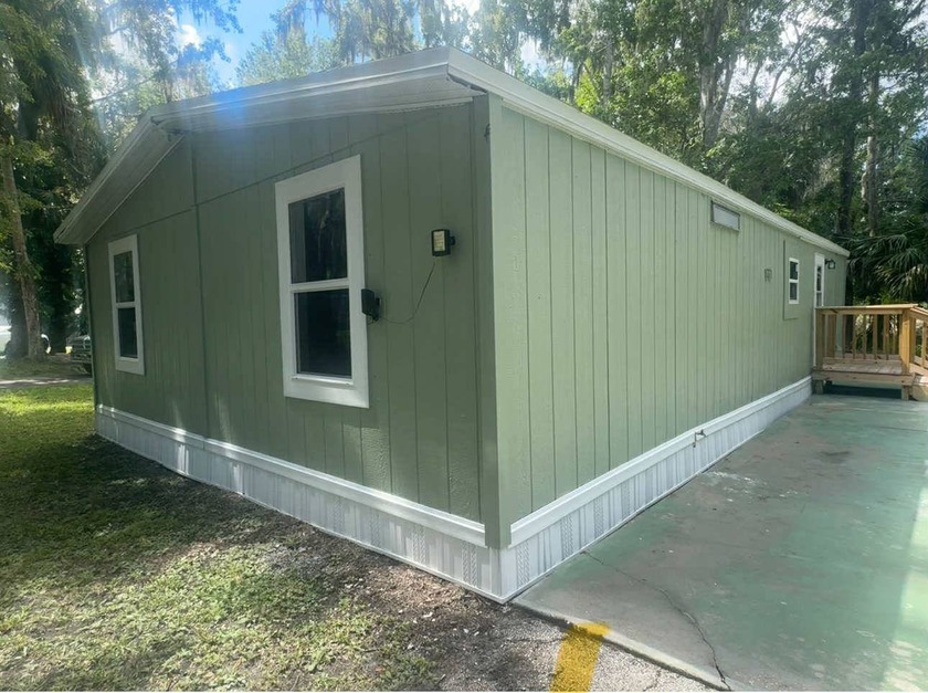 This charming 1989 double wide manufactured home offers 960 sq - Beach Home for sale in New Smyrna Beach, Florida on Beachhouse.com