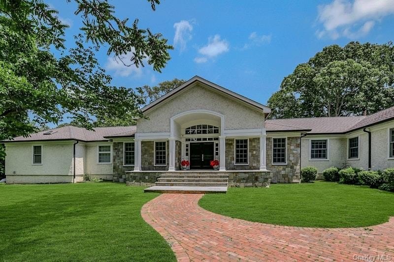 Welcome to this beautifully expanded 4937sq ft ranch located in - Beach Home for sale in Oyster Bay, New York on Beachhouse.com