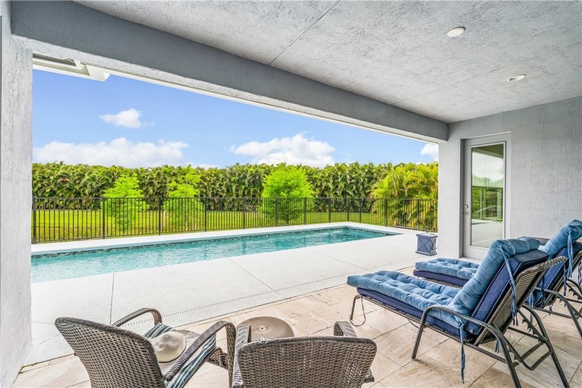 Step into sleek, modern Florida living with this 2019 lakefront - Beach Home for sale in Vero Beach, Florida on Beachhouse.com